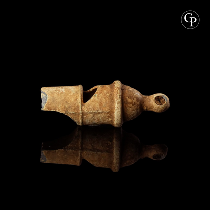 Ancient Roman lead whistle (sifflet en plomb) from a legionary, 1st-3rd century AD. Rare military artifact with characteristic cylindrical body and mouthpiece. | Sifflet en plomb romain antique, légionnaire, Ier-IIIe siècle apr. J.-C. Rare artefact militaire à corps cylindrique et embouchure caractéristique.
