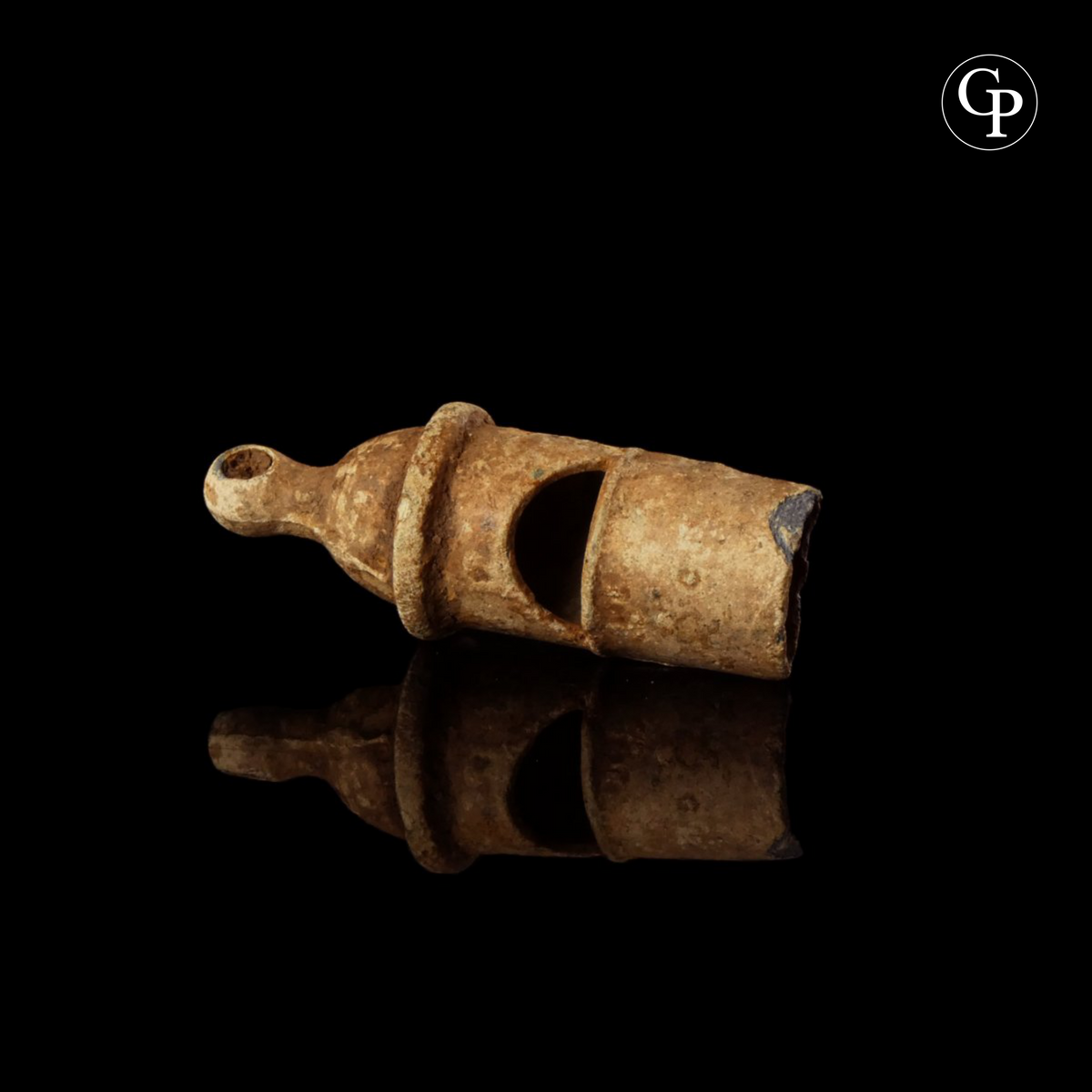 Ancient Roman lead whistle (sifflet en plomb) from a legionary, 1st-3rd century AD. Rare military artifact with characteristic cylindrical body and mouthpiece. | Sifflet en plomb romain antique, légionnaire, Ier-IIIe siècle apr. J.-C. Rare artefact militaire à corps cylindrique et embouchure caractéristique.